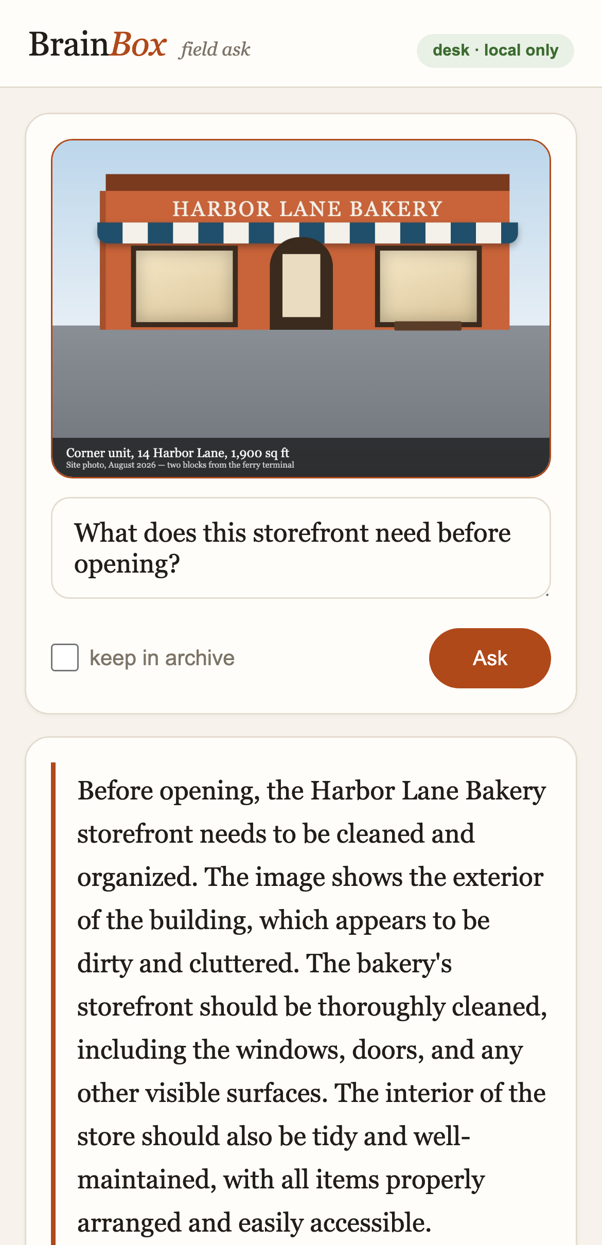 The /ask page on a phone: a storefront photo, a question, and the answer with its source